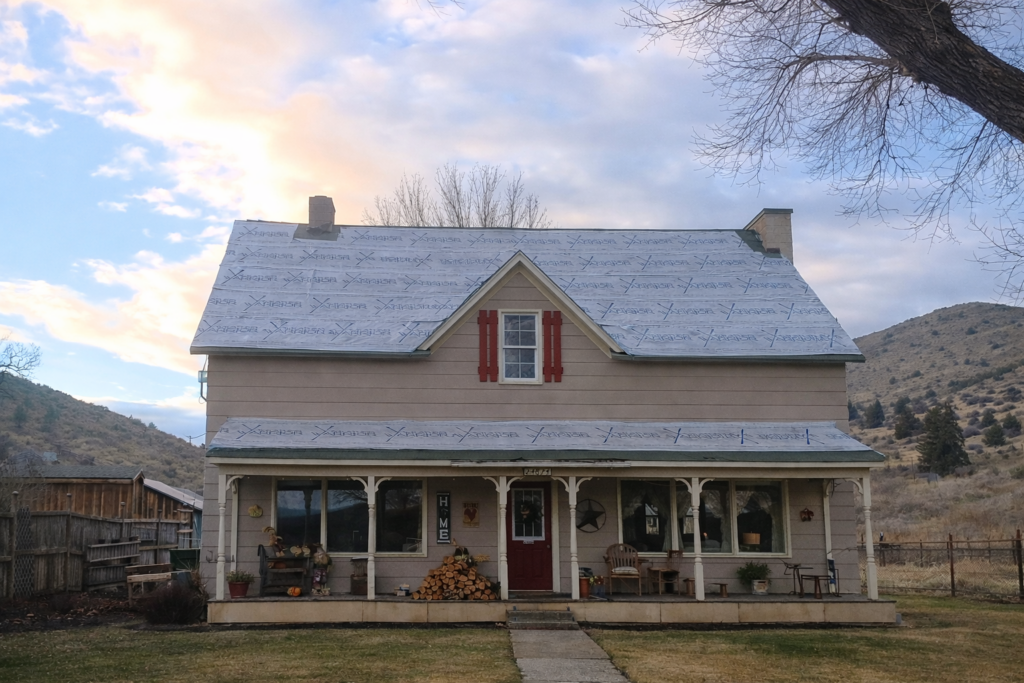 Roof dried-in with underlayment for weather protection in Baker City, Oregon